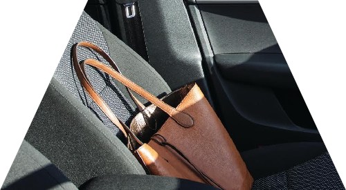 a bag laying on an auto seat